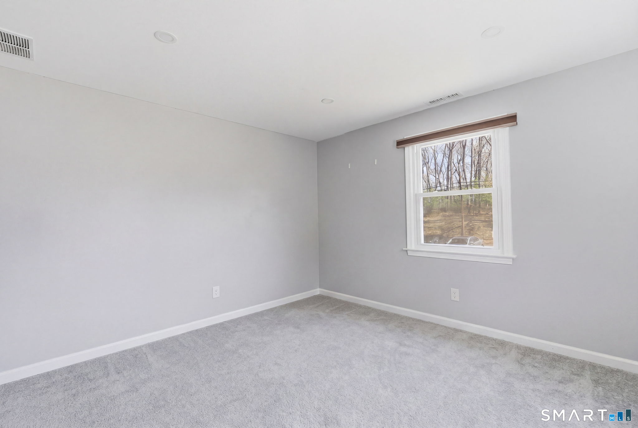 99 West Chippens Hill Road Burlington, CT 06013 - Photo 25 of 40 an empty room with a window
