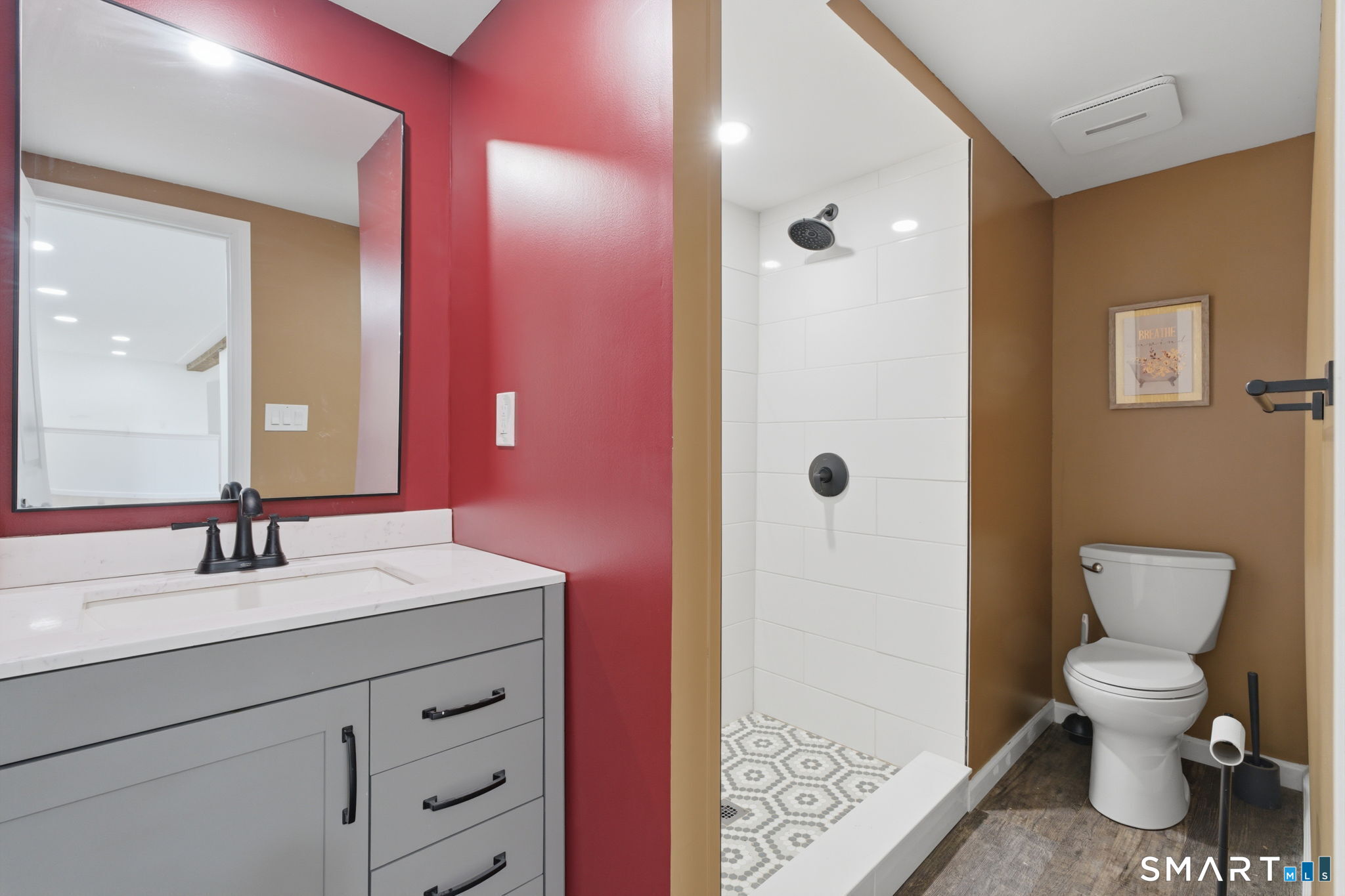 99 West Chippens Hill Road Burlington, CT 06013 - Photo 39 of 40 a bathroom with a sink a toilet and shower