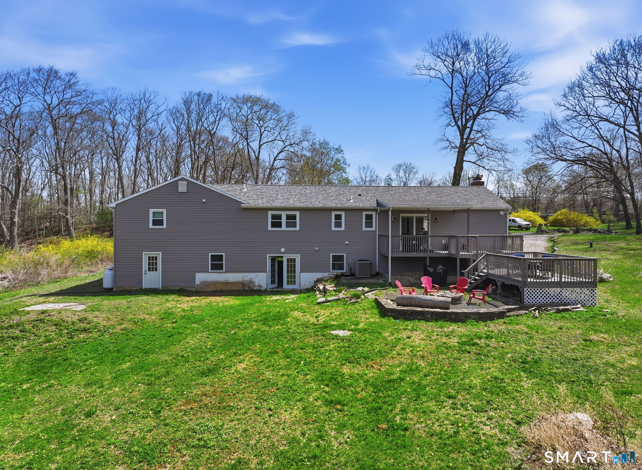 99 West Chippens Hill Road Burlington, CT 06013 - Photo 4 of 40 a view of a house with backyard and sitting area
