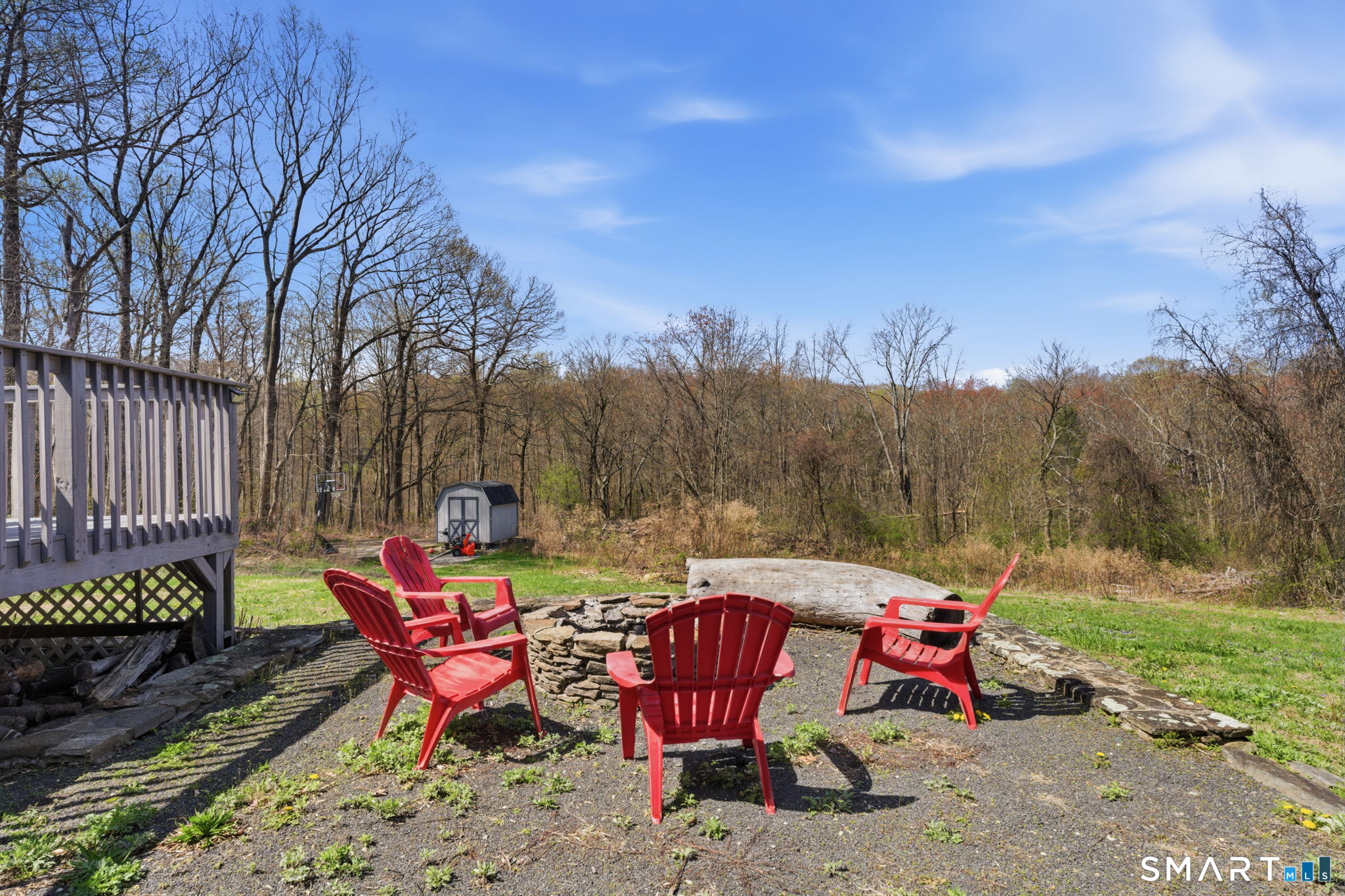 99 West Chippens Hill Road Burlington, CT 06013 - Photo 6 of 40 a view of a patio with table and chairs with wooden fence