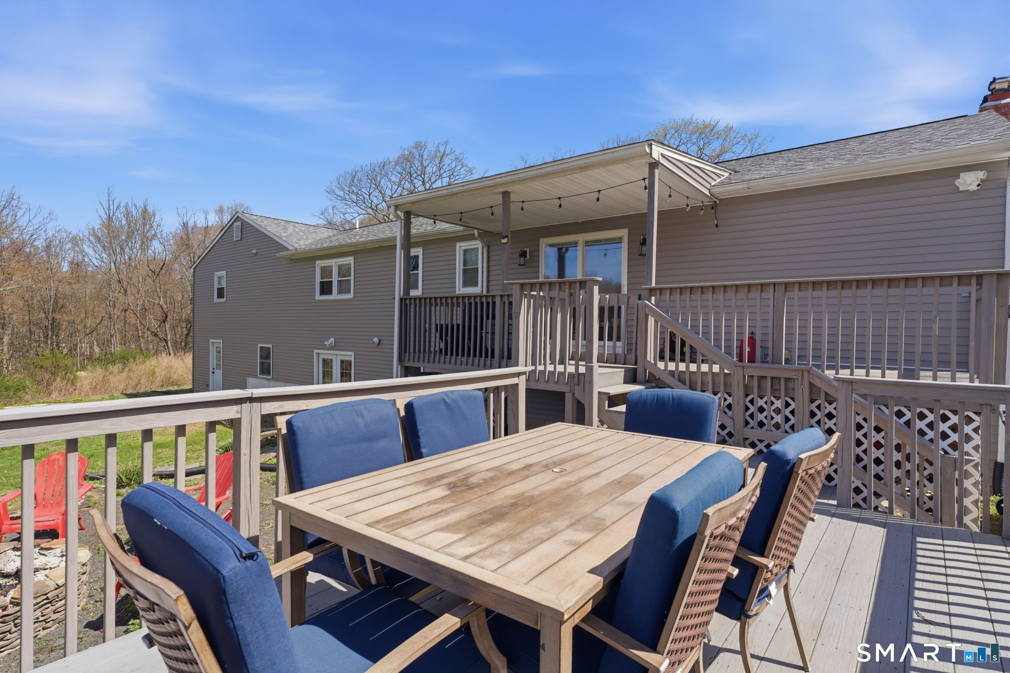 99 West Chippens Hill Road Burlington, CT 06013 - Photo 7 of 40 a view of a patio with a table and chairs