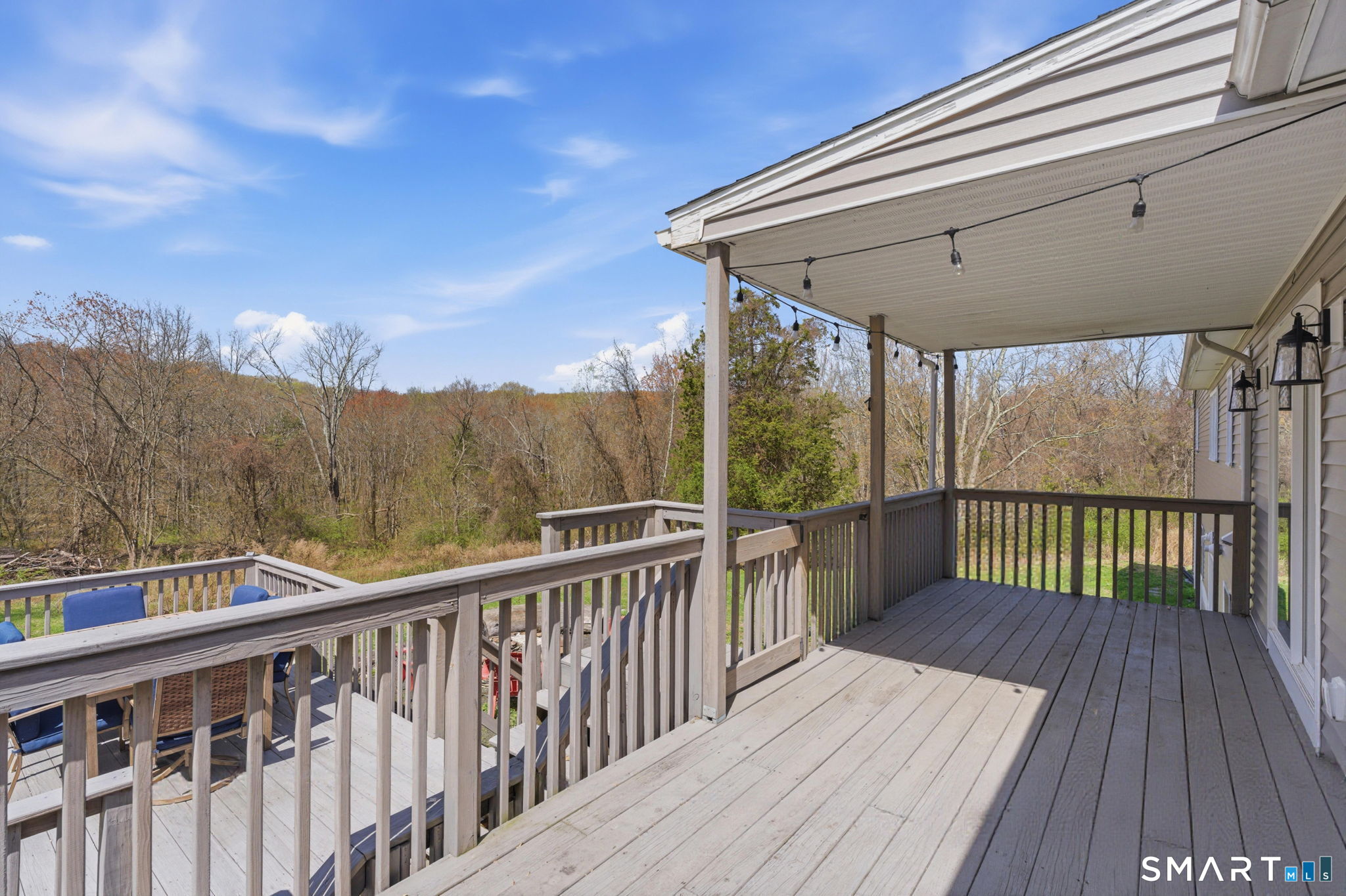 99 West Chippens Hill Road Burlington, CT 06013 - Photo 8 of 40 a view of a wooden deck with sunset view