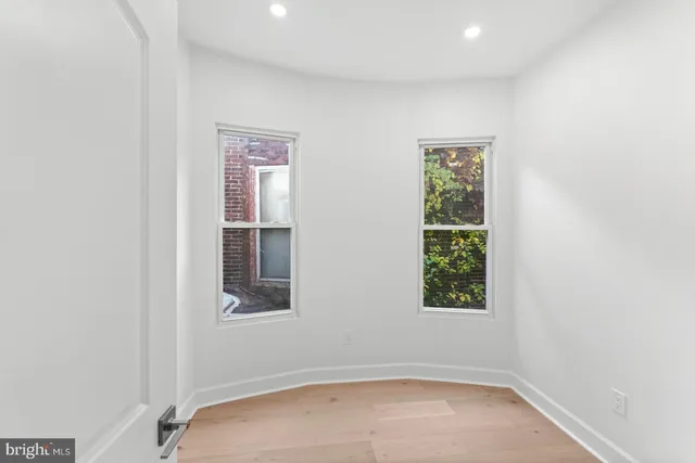 an empty room with windows