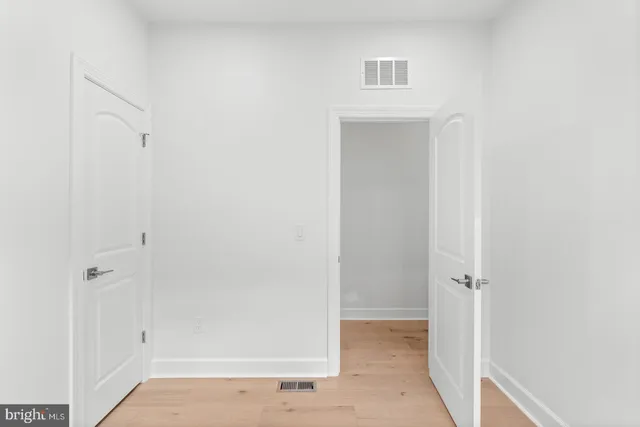 a view of a hallway with closet