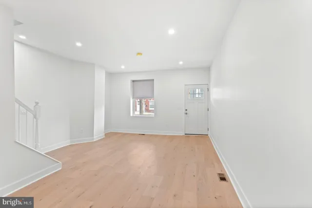 an empty room with windows