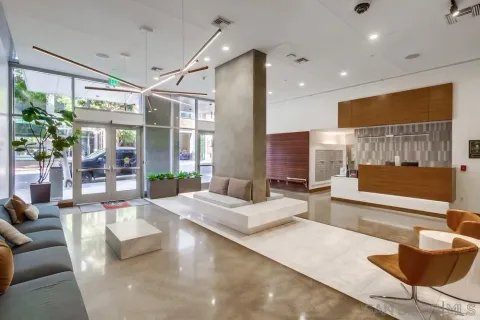 a view of a balcony with an outdoor seating