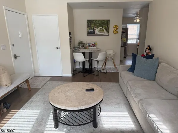a living room with a couch and a table