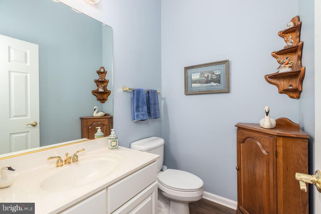 11324 River Run Lane Berlin, MD 21811 - Photo 16 of 50 a bathroom with a toilet and a sink