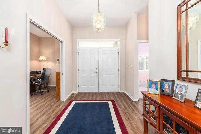 a very nice looking room with wooden floor