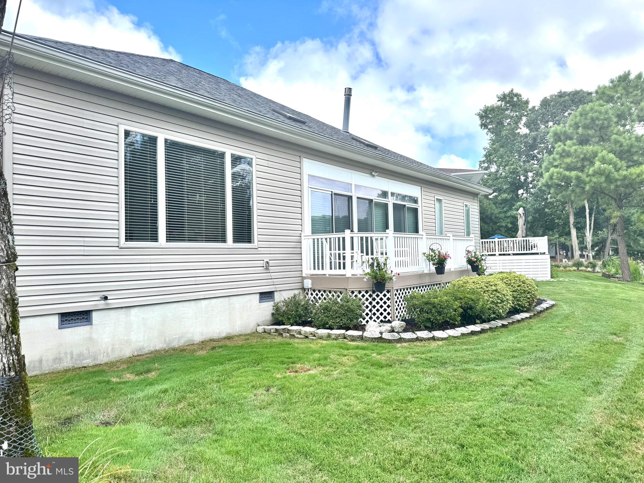 11324 River Run Lane Berlin, MD 21811 - Photo 35 of 50 a front view of a house with a garden
