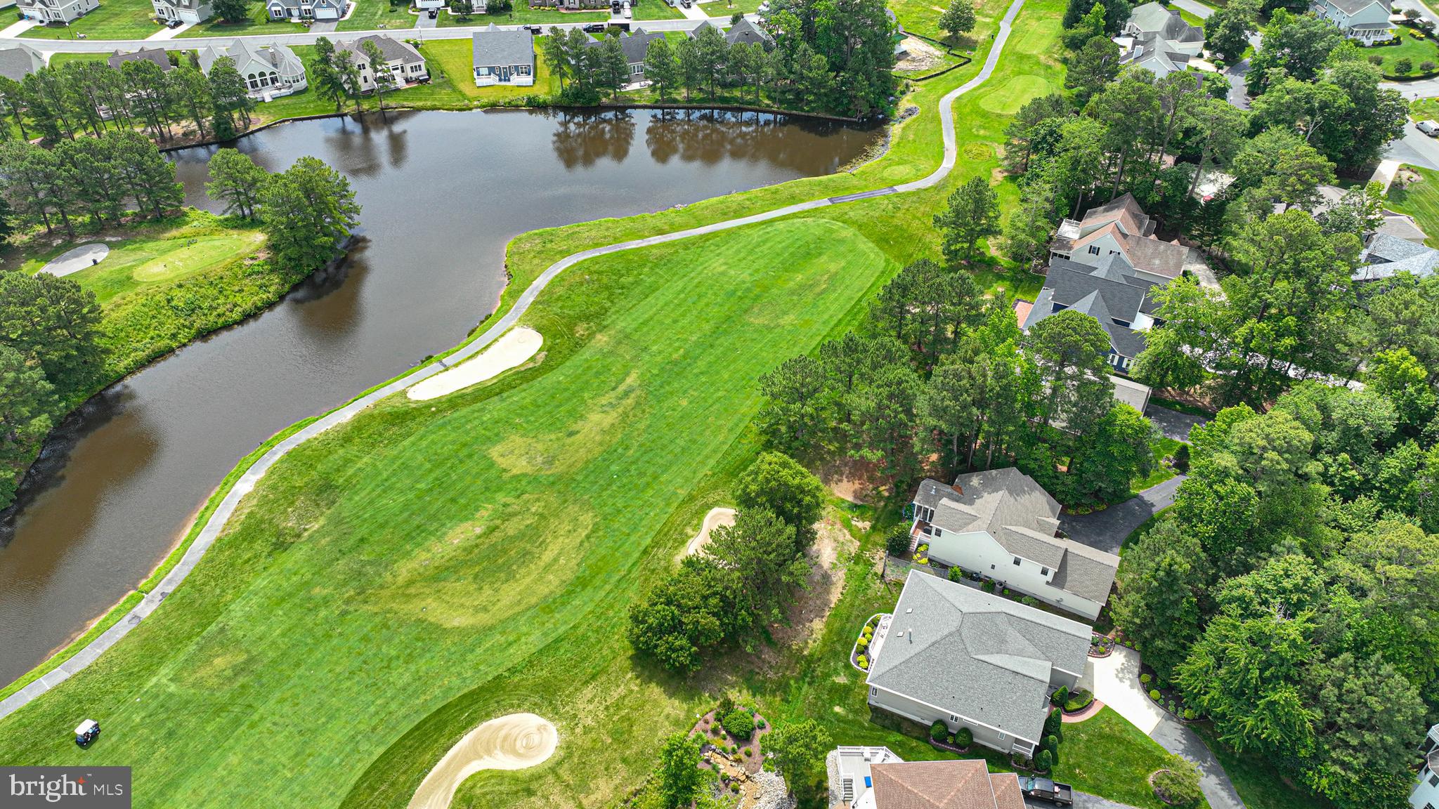 11324 River Run Lane Berlin, MD 21811 - Photo 42 of 50 an aerial view of a house with a garden and lake view