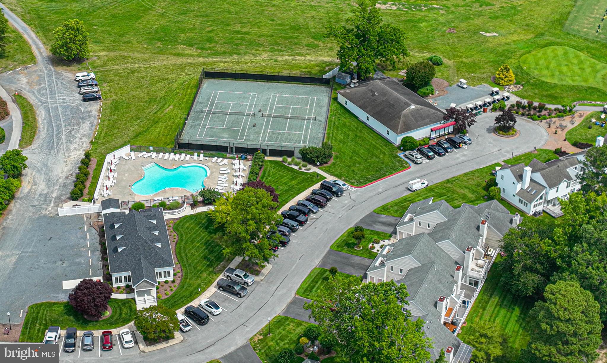 11324 River Run Lane Berlin, MD 21811 - Photo 49 of 50 an aerial view of a house with a yard and outdoor seating