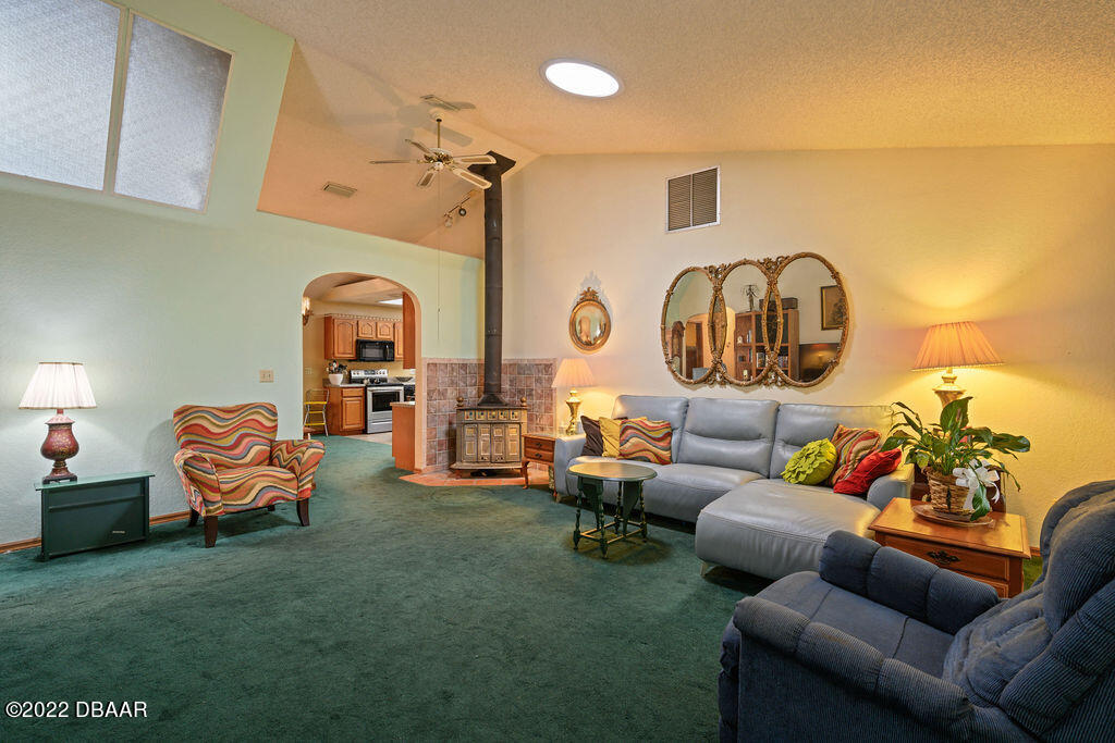2160 Wilmhurst Road DeLand, FL 32720 - Photo 3 of 28 Living Room with Wood Burning Fireplace