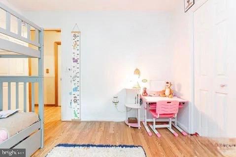 4202 Lakeview Parkway Locust Grove, VA 22508 - Photo 23 of 32 a living room with a baby crib furniture and a window