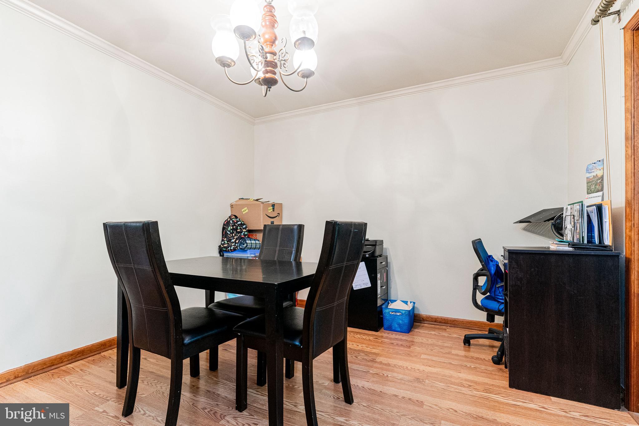 4202 Lakeview Parkway Locust Grove, VA 22508 - Photo 26 of 32 a view of a dining room with furniture and wooden floor