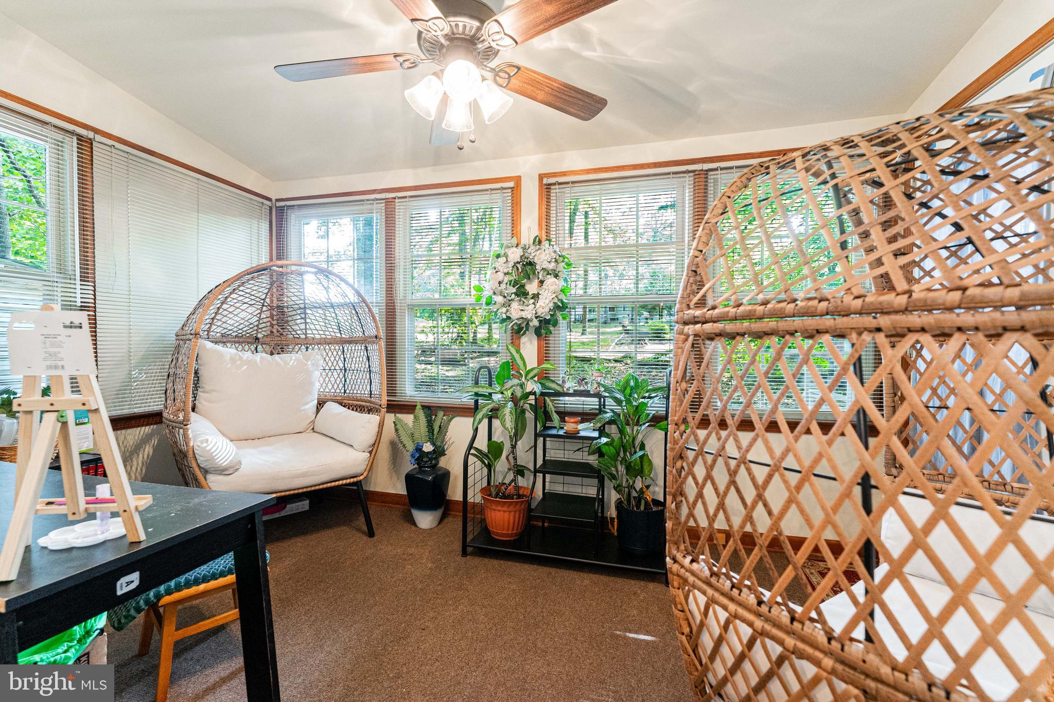 4202 Lakeview Parkway Locust Grove, VA 22508 - Photo 27 of 32 a living room with furniture and a floor to ceiling window