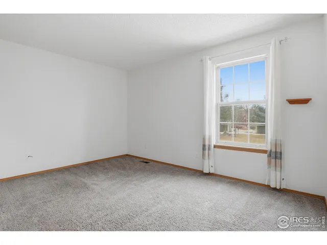 a view of balcony with furniture