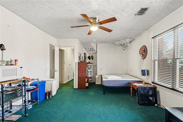 a room with furniture and a window