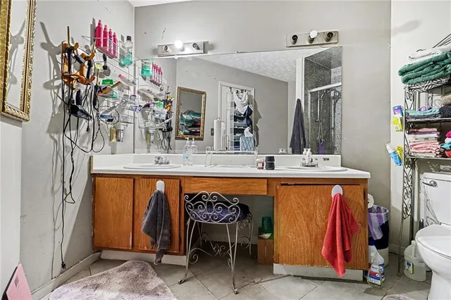 a dining hall with a sink and a mirror