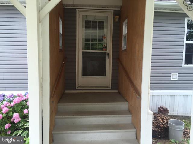 21269 Dover Bridge Road, Unit 5 Preston, MD 21655 - Photo 4 of 21 Exterior (Rear)