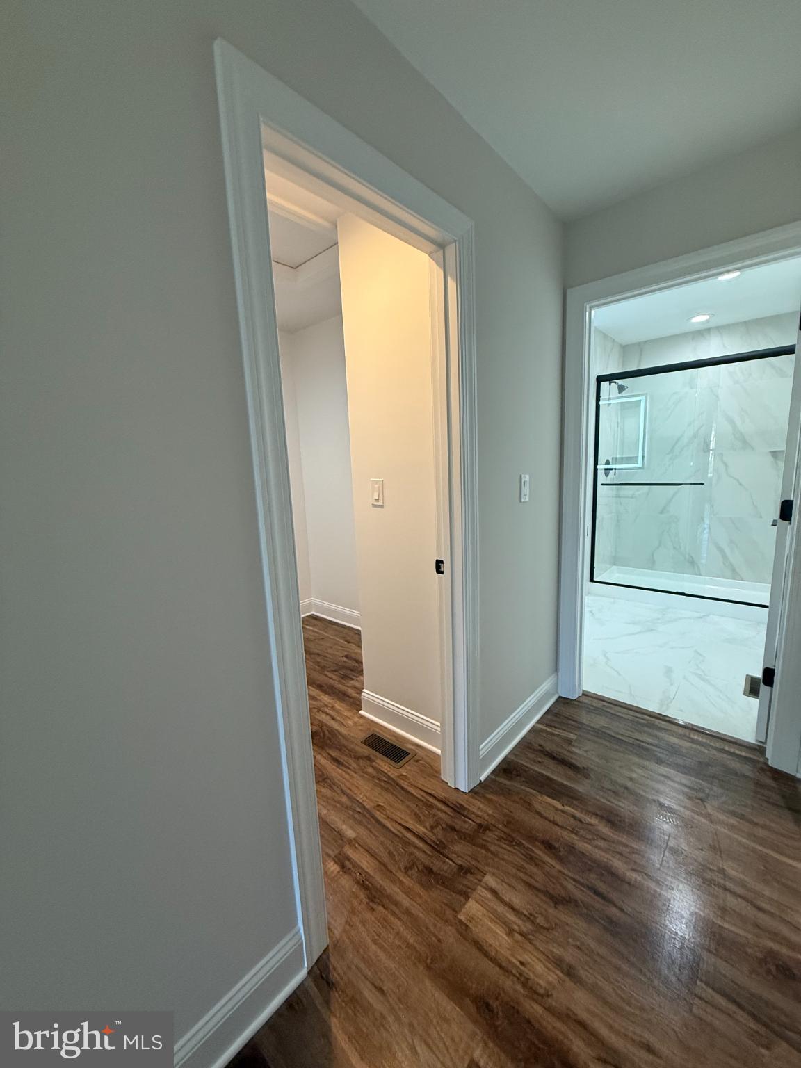 206 Saylers Creek Road Locust Grove, VA 22508 - Photo 11 of 42 an empty room with wooden floor and door