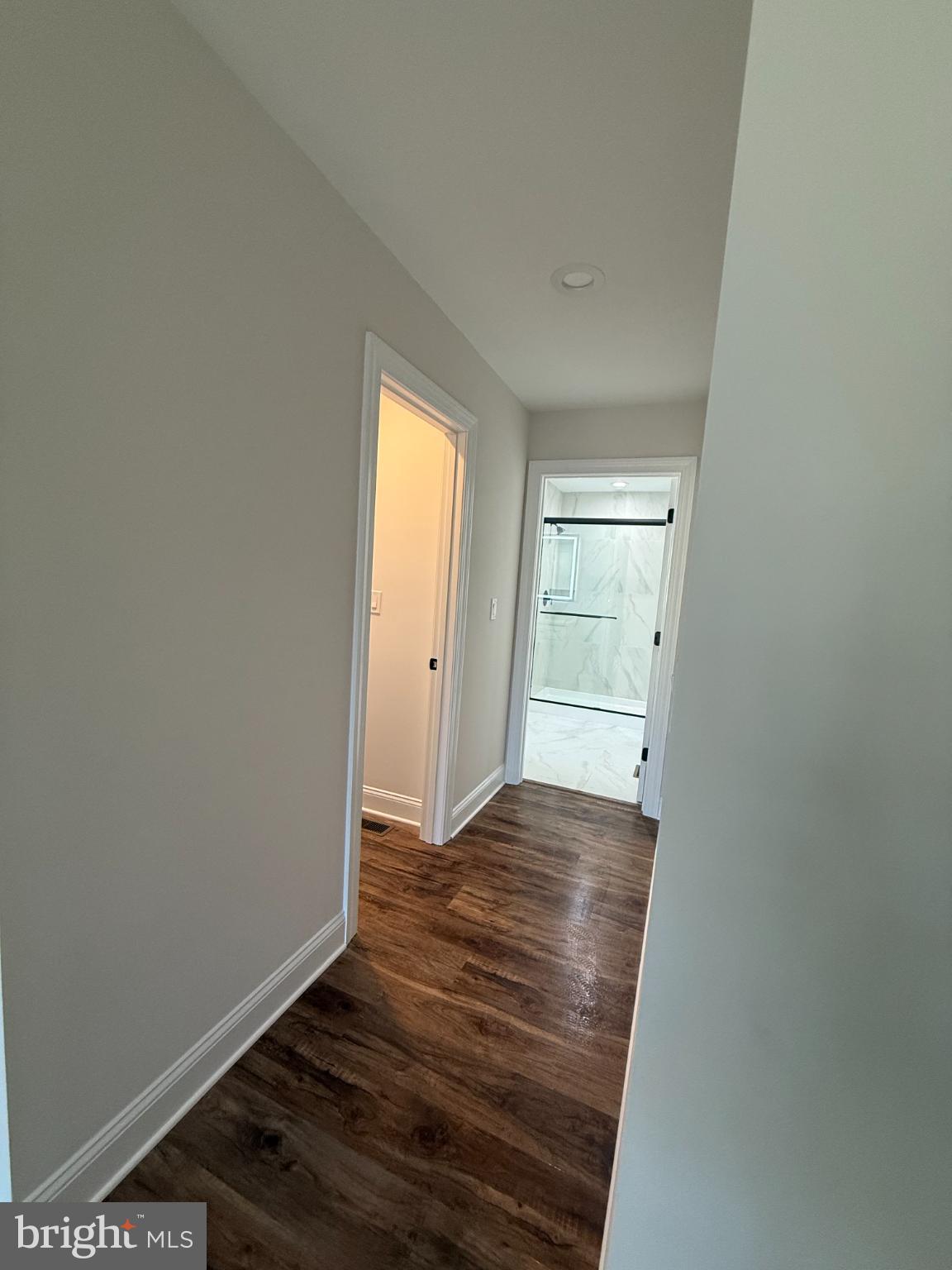 206 Saylers Creek Road Locust Grove, VA 22508 - Photo 12 of 42 a view of an empty room with wooden floor and a window