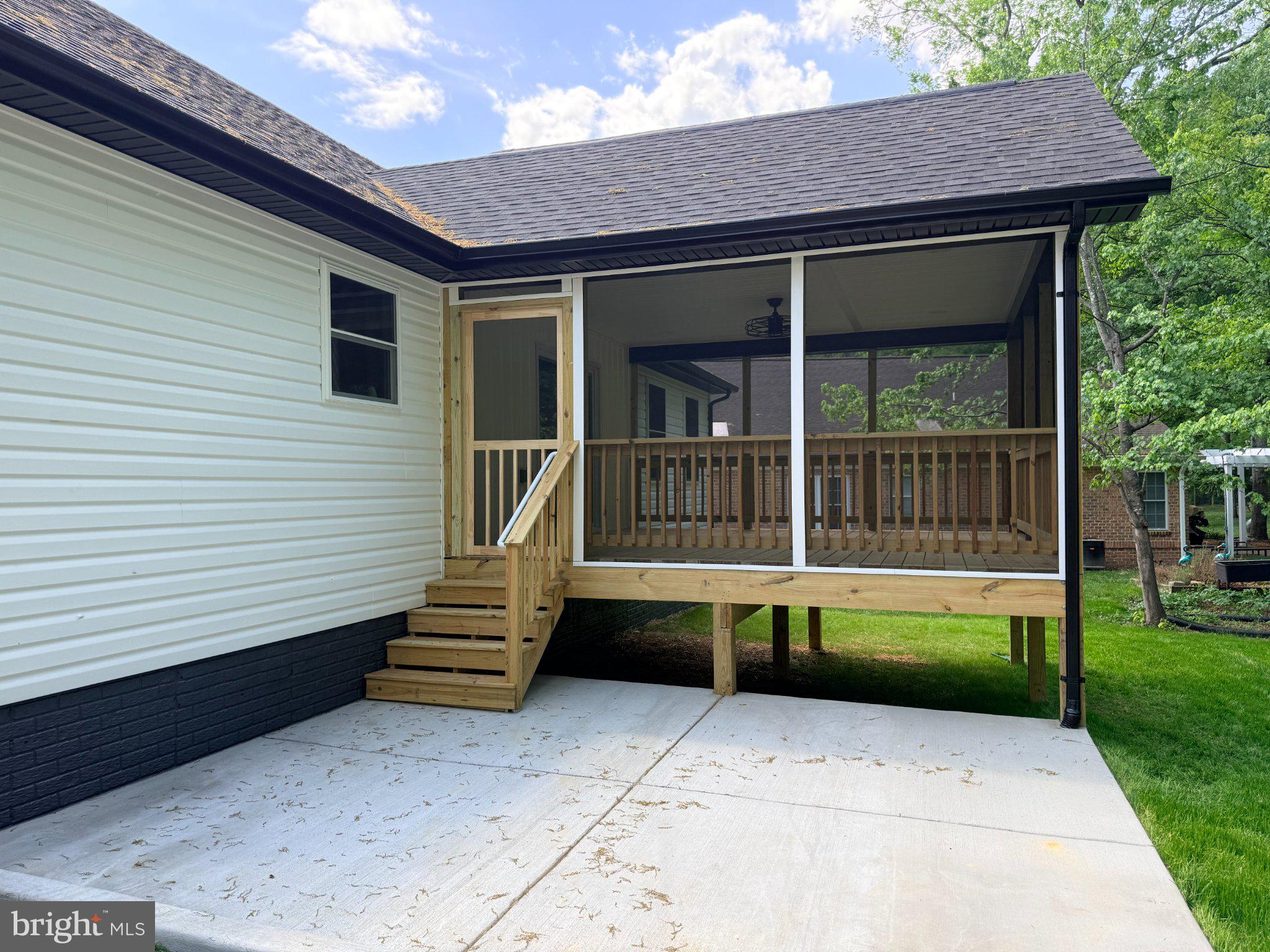 206 Saylers Creek Road Locust Grove, VA 22508 - Photo 14 of 49 a view of house with backyard and outdoor seating