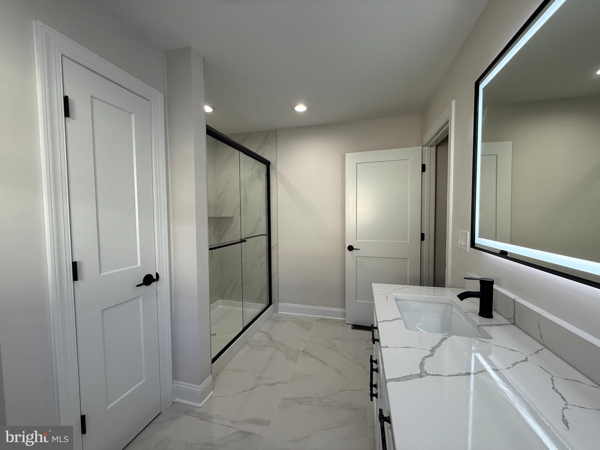 206 Saylers Creek Road Locust Grove, VA 22508 - Photo 18 of 42 a bathroom with a bathtub and a shower