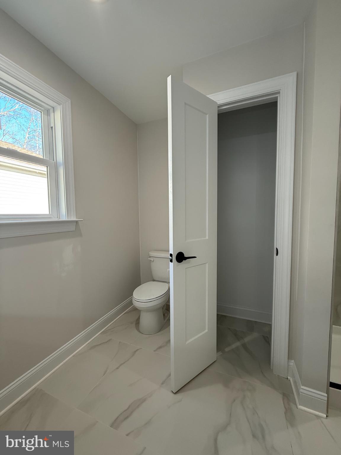 206 Saylers Creek Road Locust Grove, VA 22508 - Photo 19 of 42 a bathroom with a toilet