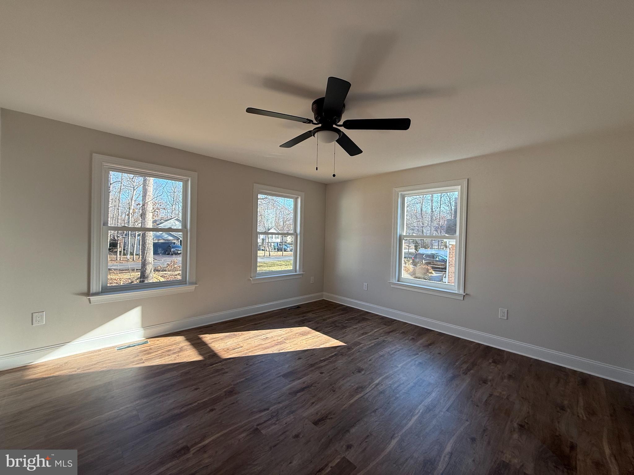 206 Saylers Creek Road Locust Grove, VA 22508 - Photo 23 of 42 a view of an empty room with wooden floor and a window