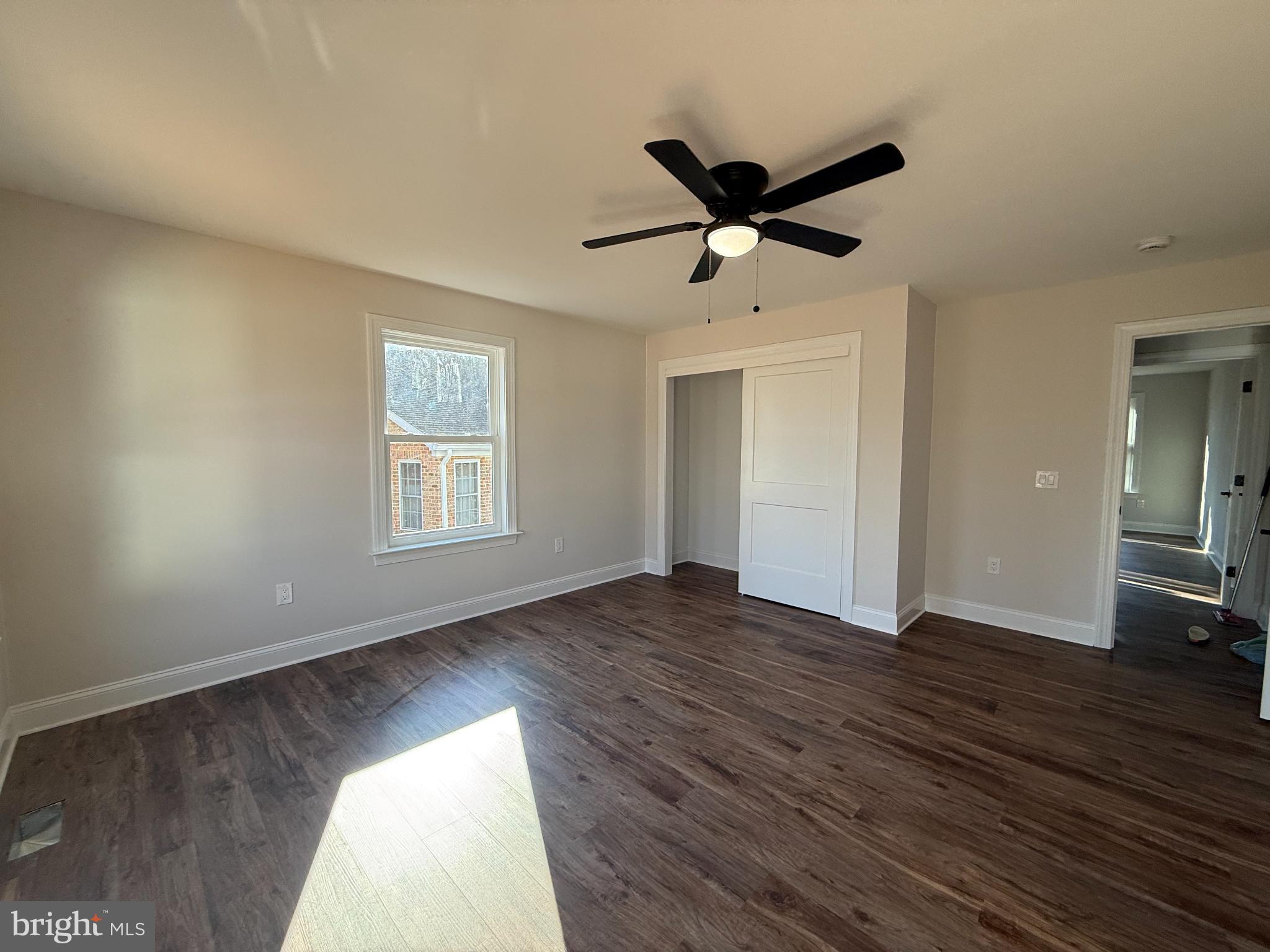 206 Saylers Creek Road Locust Grove, VA 22508 - Photo 24 of 42 a view of empty room with wooden floor and fan