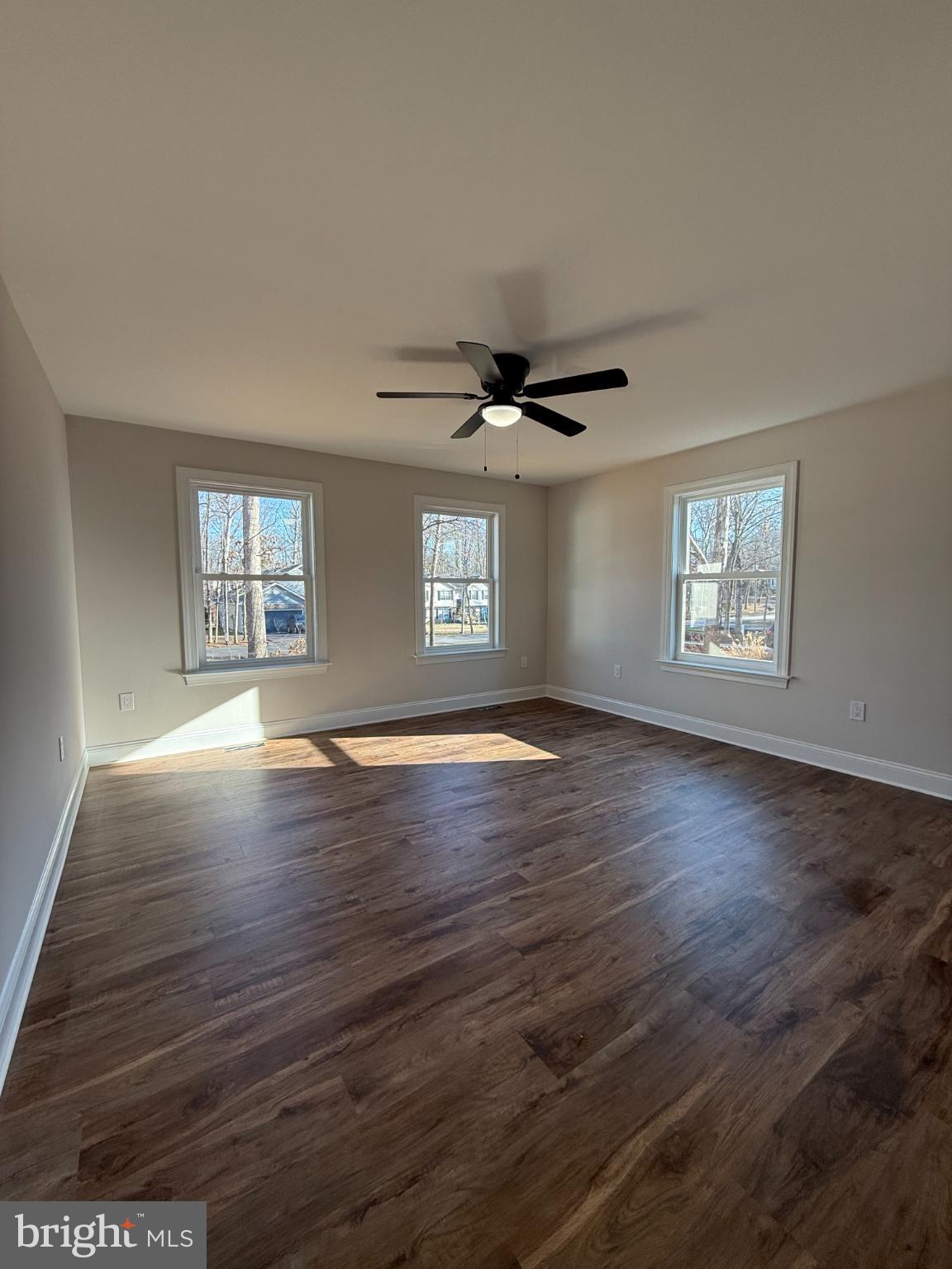 206 Saylers Creek Road Locust Grove, VA 22508 - Photo 27 of 42 a view of a big room with wooden floor and windows