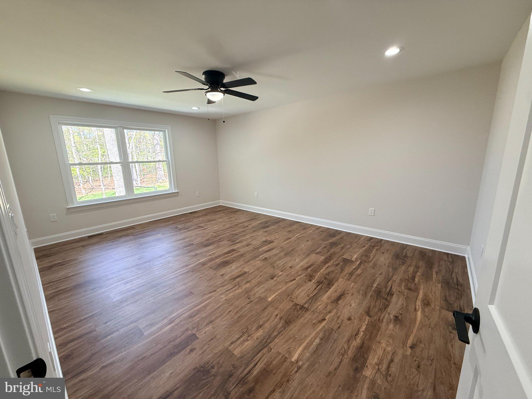 206 Saylers Creek Road Locust Grove, VA 22508 - Photo 28 of 49 wooden floor in an empty room with a window