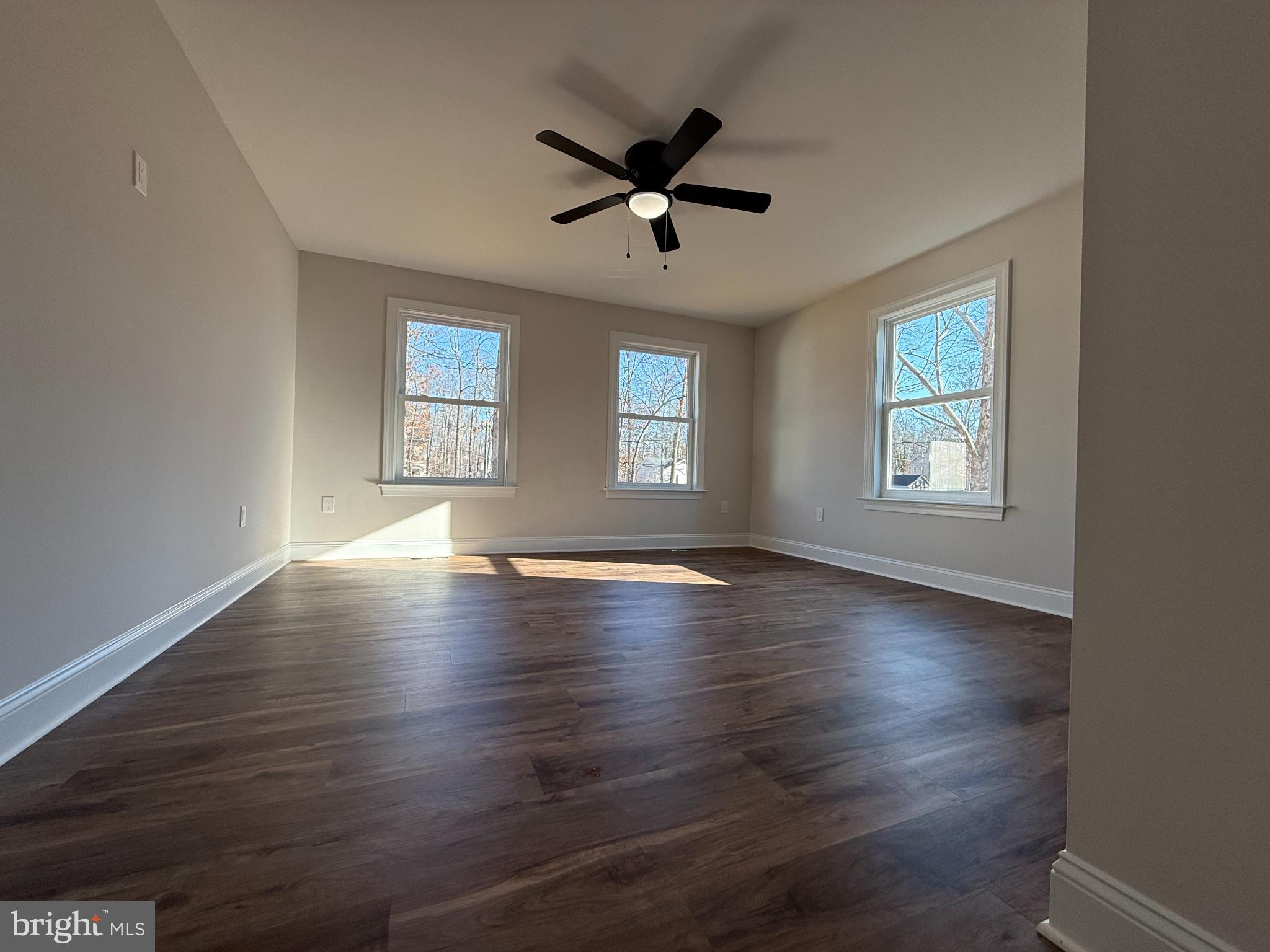 206 Saylers Creek Road Locust Grove, VA 22508 - Photo 28 of 42 a view of empty room with wooden floor and fan