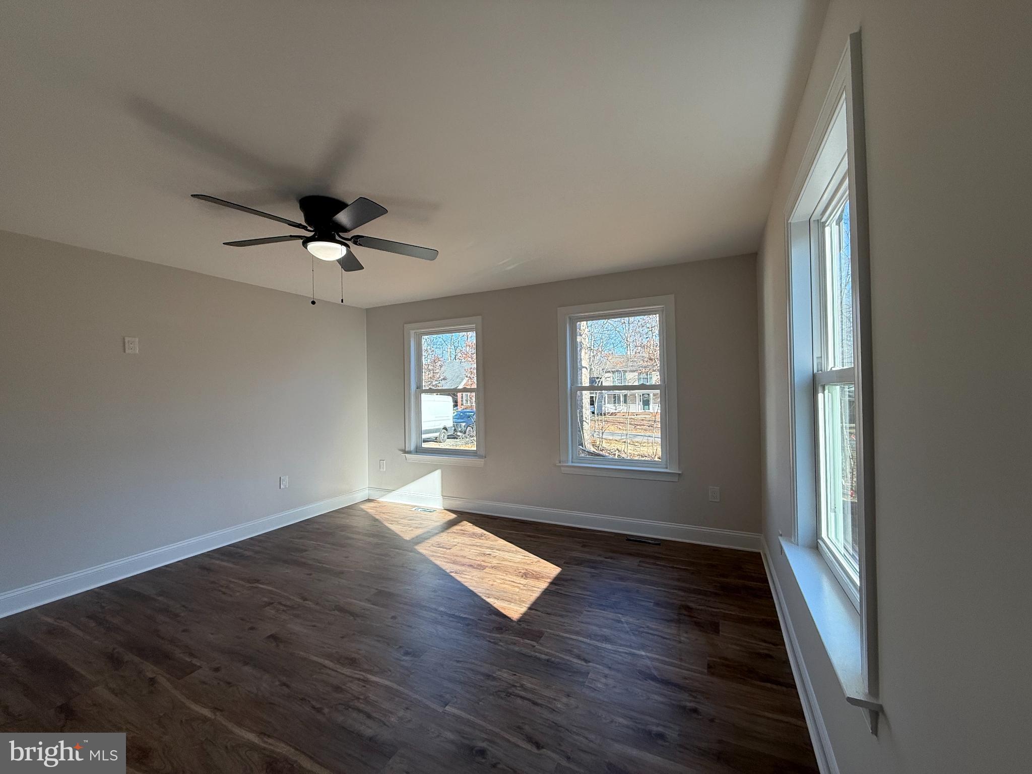 206 Saylers Creek Road Locust Grove, VA 22508 - Photo 36 of 49 a view of an empty room with a window and wooden floor