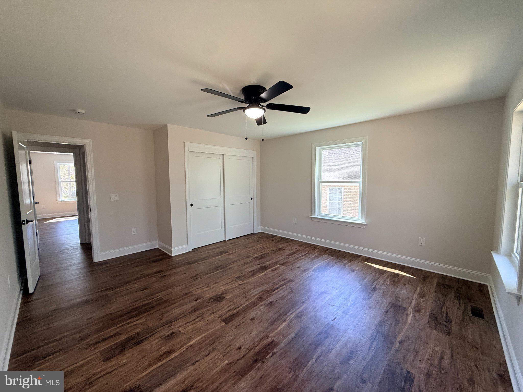 206 Saylers Creek Road Locust Grove, VA 22508 - Photo 40 of 49 wooden floor in an empty room with a window