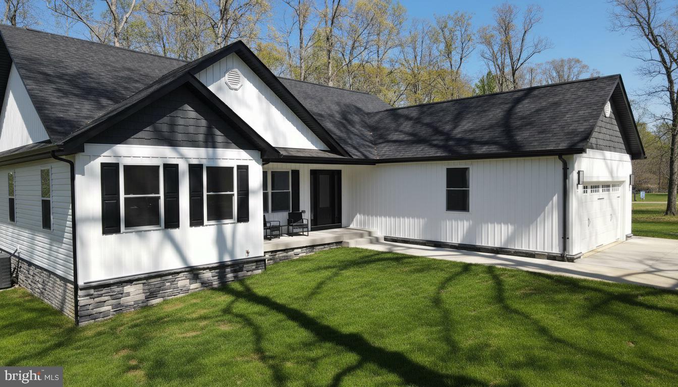 206 Saylers Creek Road Locust Grove, VA 22508 - Photo 4 of 49 Charming modern home with lush greenery.