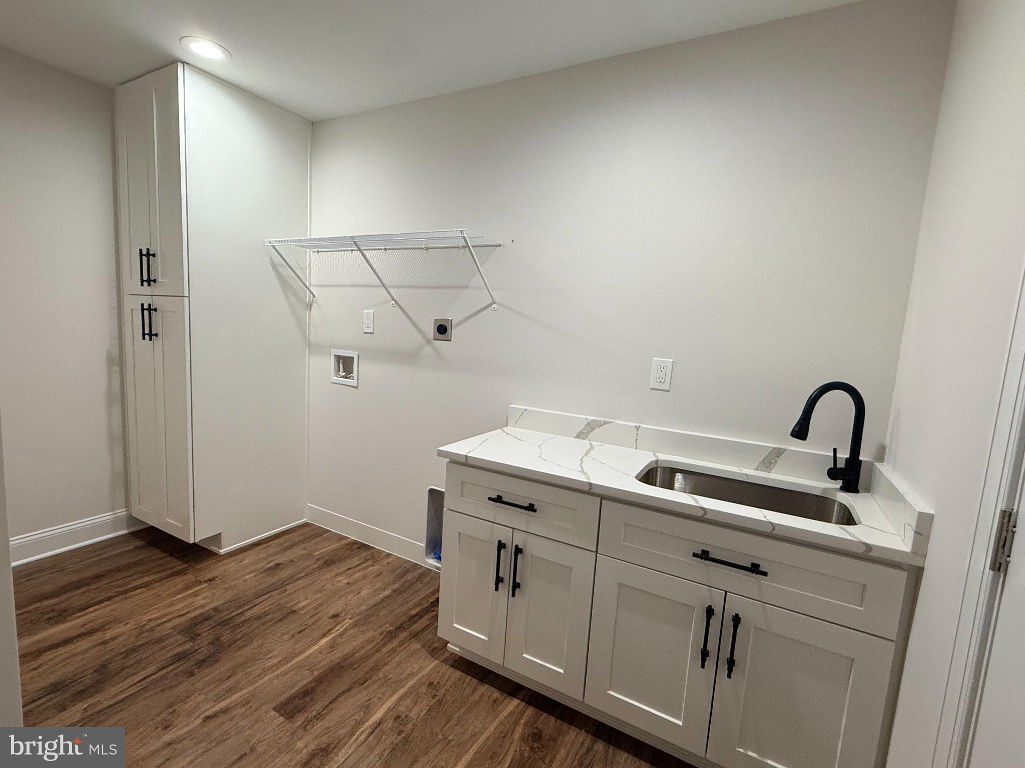 206 Saylers Creek Road Locust Grove, VA 22508 - Photo 44 of 49 a view of a storage utility room with wooden floor