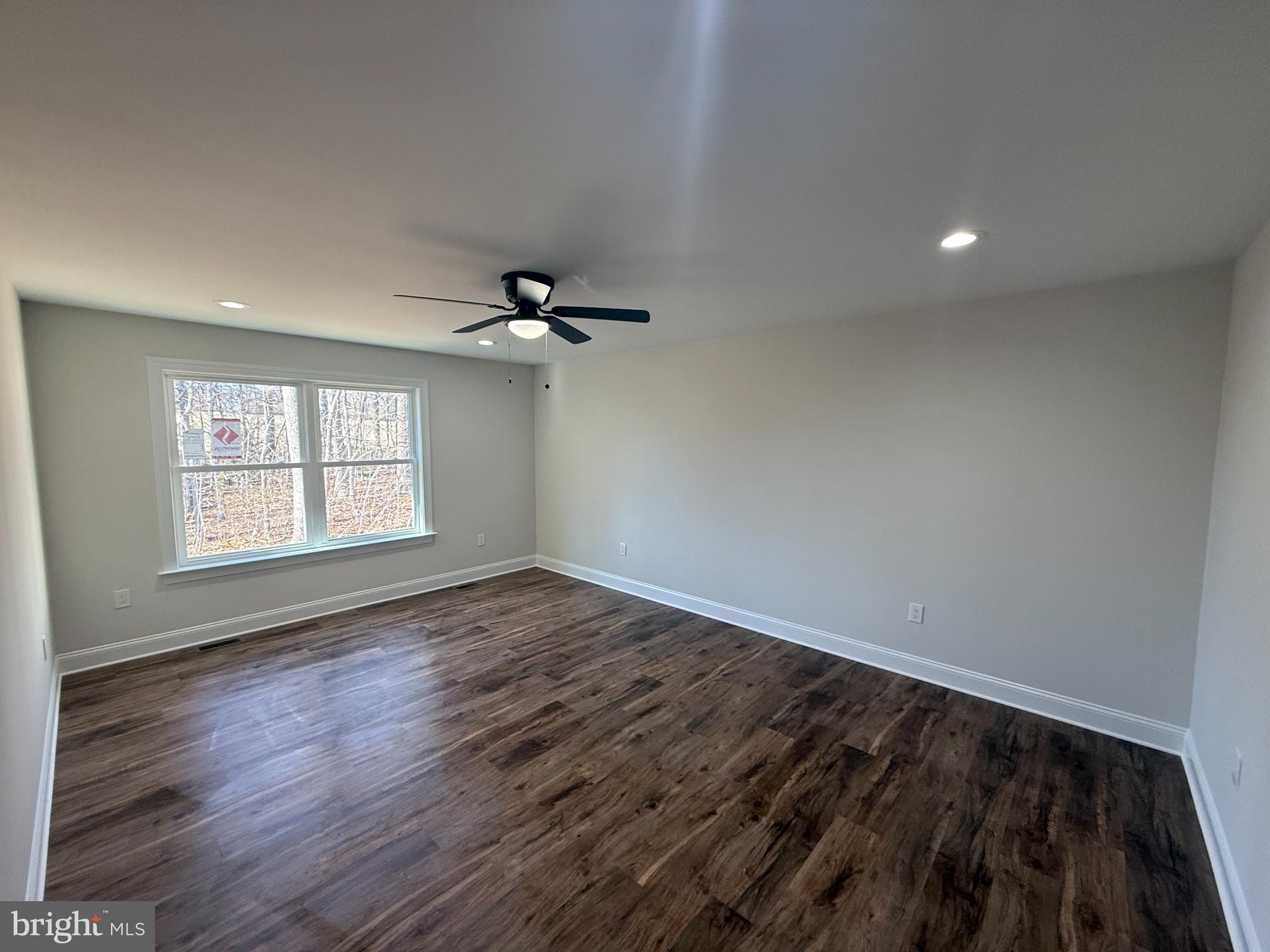 206 Saylers Creek Road Locust Grove, VA 22508 - Photo 8 of 42 a view of an empty room and a window