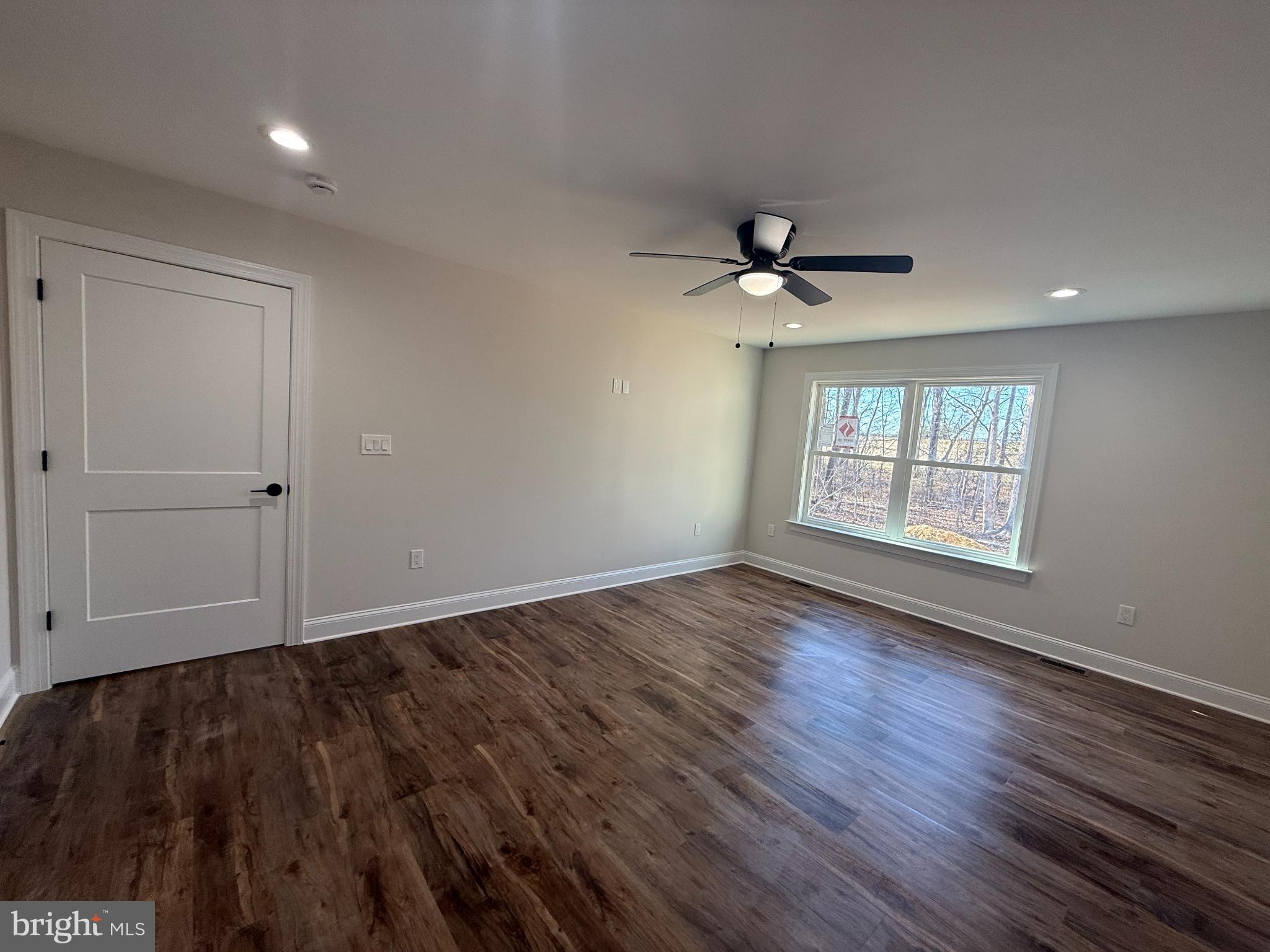 206 Saylers Creek Road Locust Grove, VA 22508 - Photo 10 of 42 wooden floor in an empty room with a window