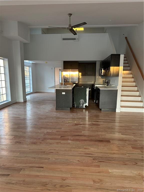 3 Banner Road, Unit 107 East Haddam, CT 06469 - Photo 18 of 18 a view of a kitchen with furniture and staircase