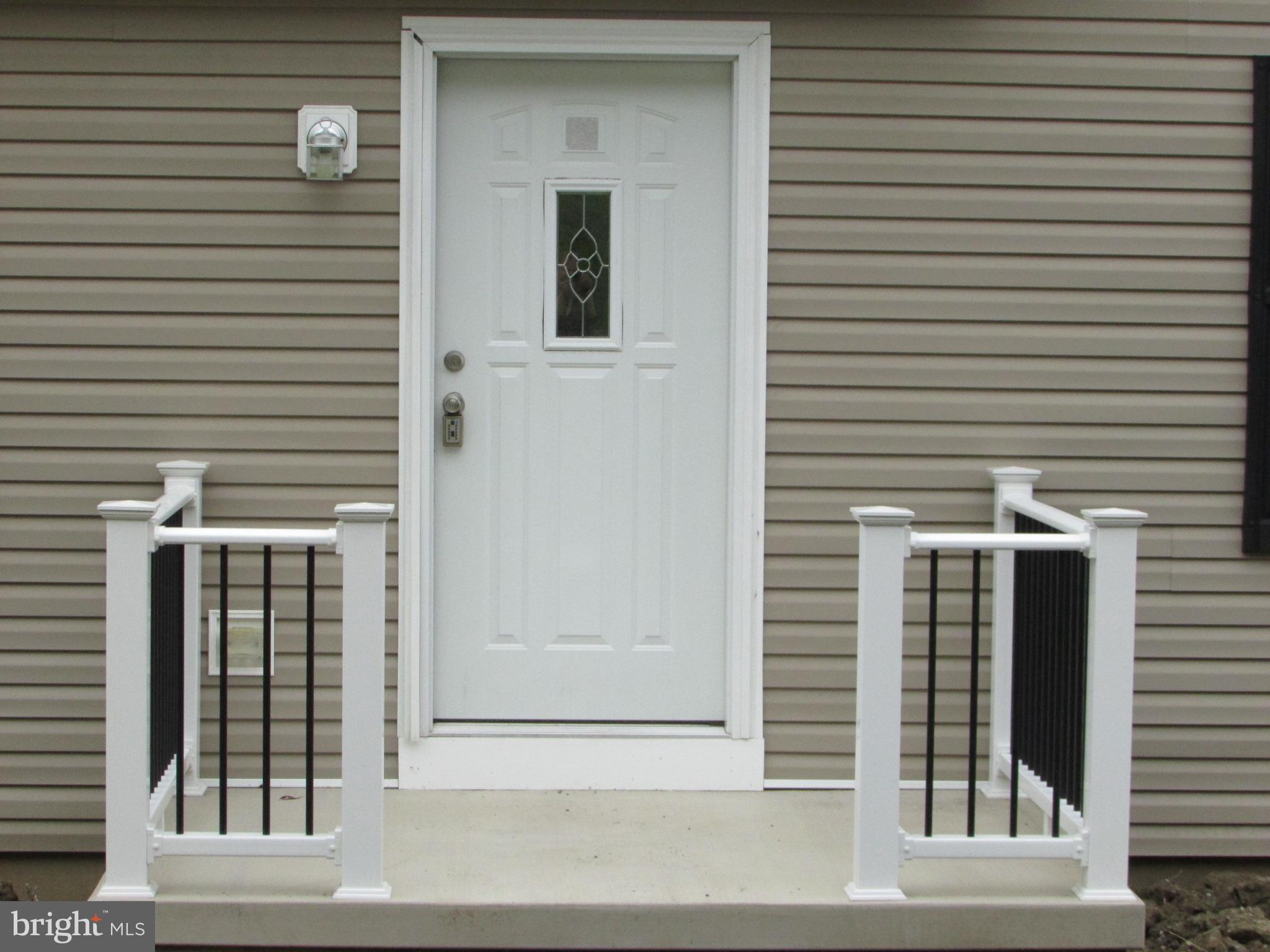 107 View Street Bellefonte, PA 16823 - Photo 2 of 42 a view of a brick house with a large window