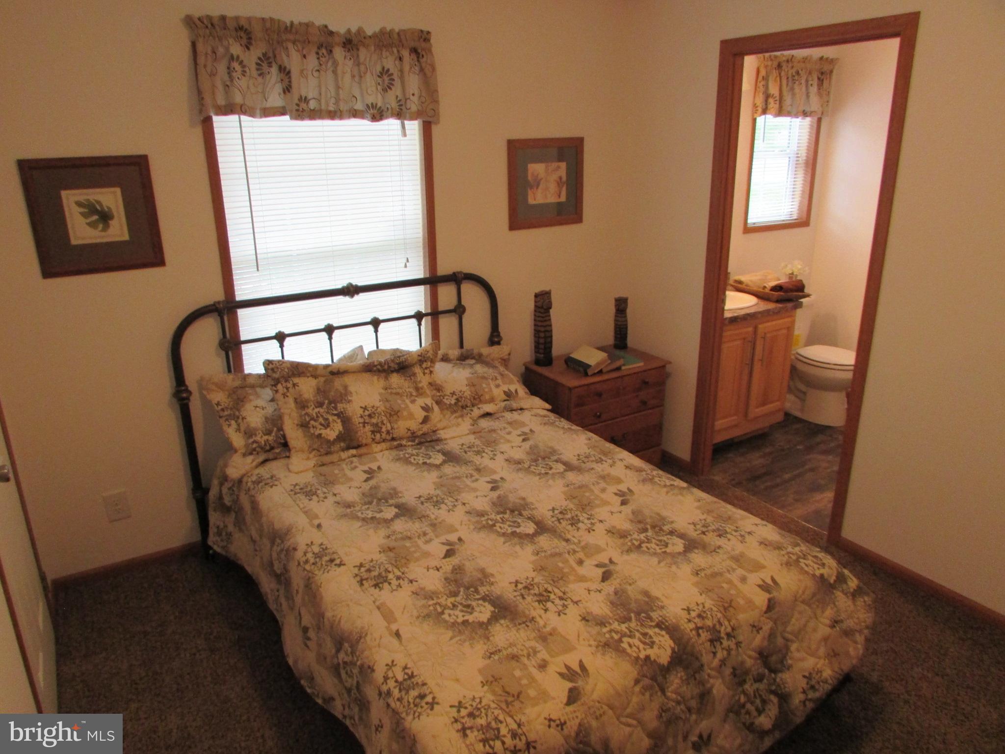 107 View Street Bellefonte, PA 16823 - Photo 25 of 42 a bedroom with a bed and a window