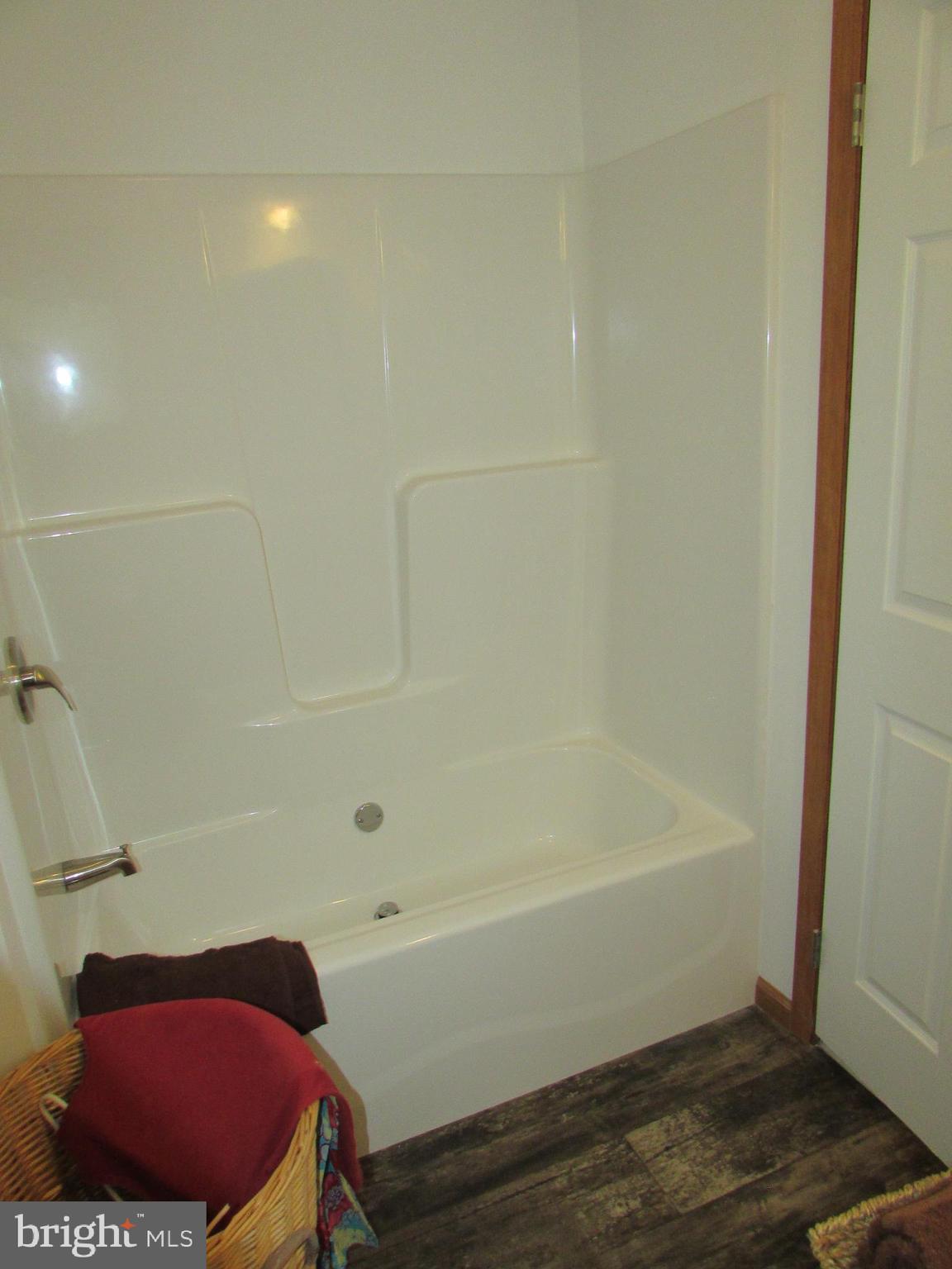 107 View Street Bellefonte, PA 16823 - Photo 27 of 42 a bathroom with a bathtub and a shower