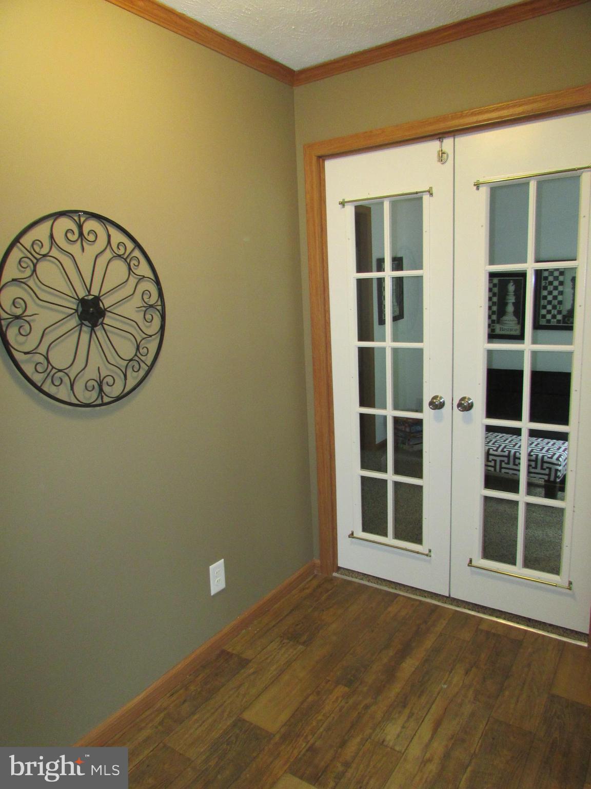 107 View Street Bellefonte, PA 16823 - Photo 3 of 42 a view of an empty room with a window