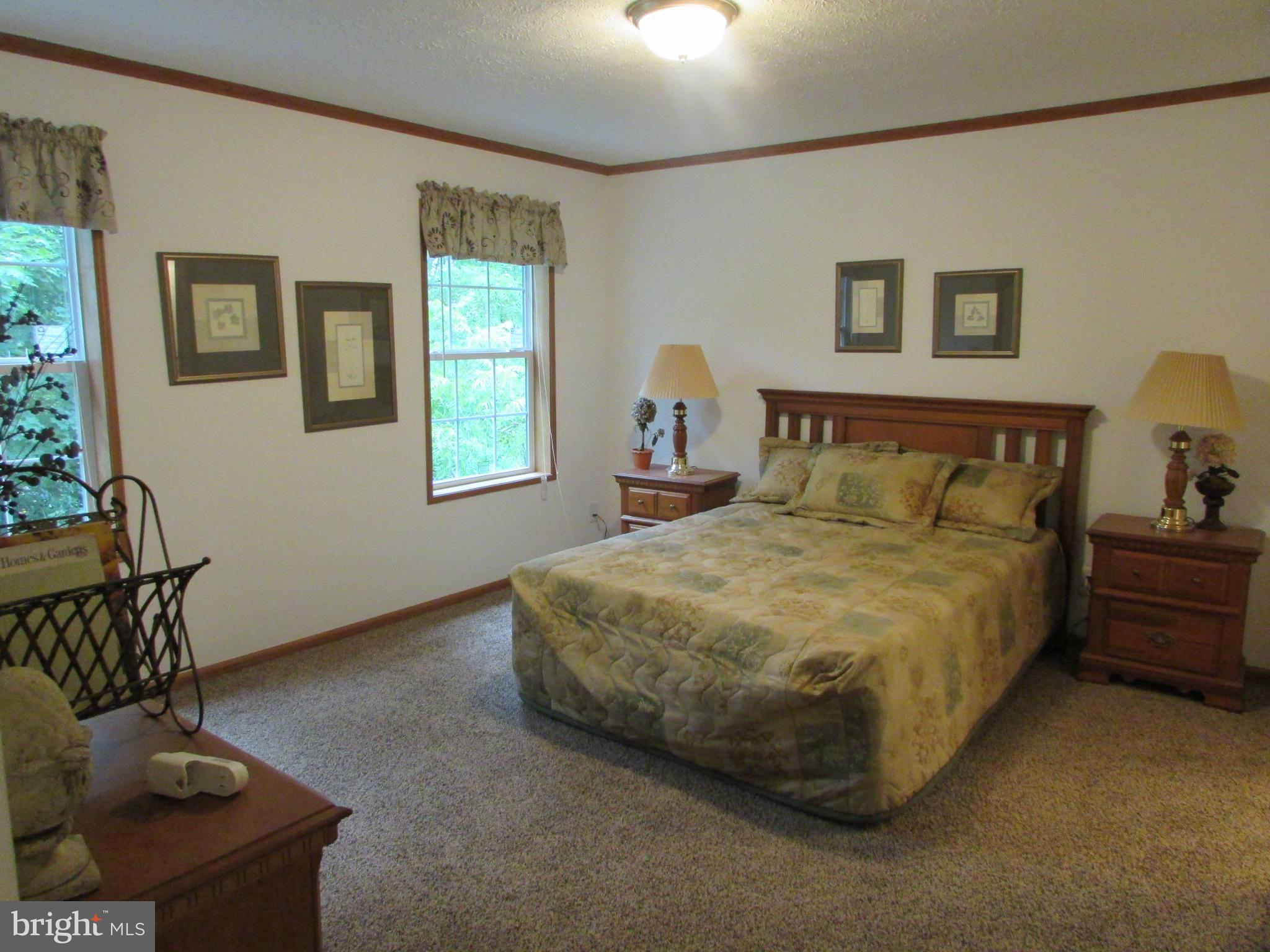 107 View Street Bellefonte, PA 16823 - Photo 31 of 42 a bedroom with a bed and window