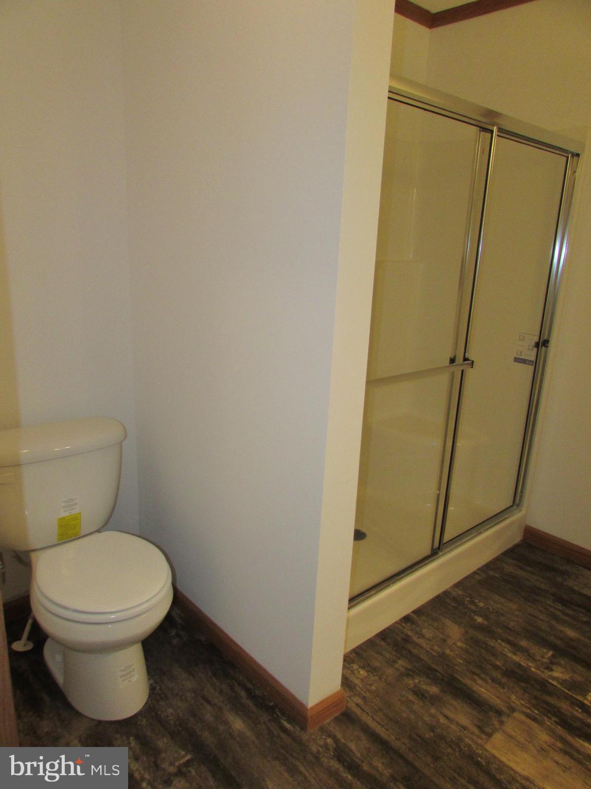 107 View Street Bellefonte, PA 16823 - Photo 34 of 42 a white toilet sitting next to a sink