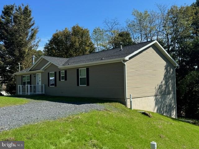 107 View Street Bellefonte, PA 16823 - Photo 41 of 42 a front view of a house with a garden