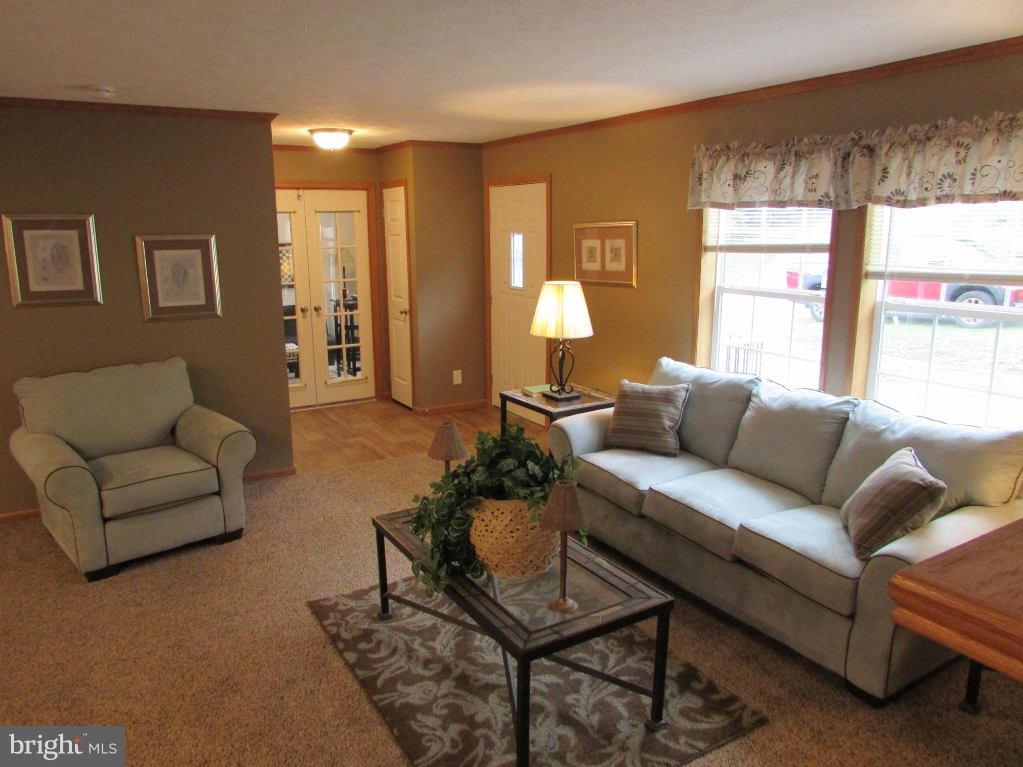 107 View Street Bellefonte, PA 16823 - Photo 7 of 42 a living room with furniture and a large window