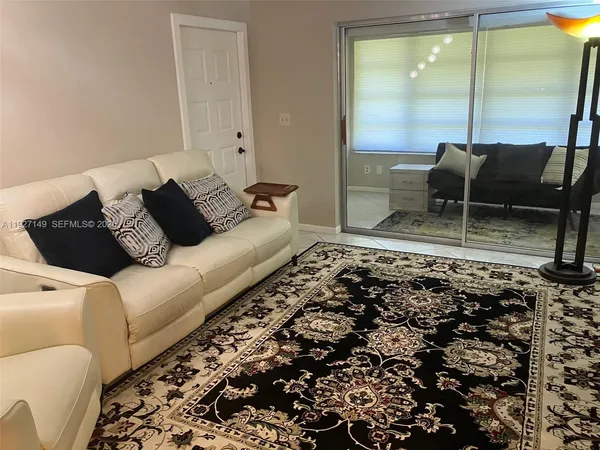 a living room with a couch and a coffee table